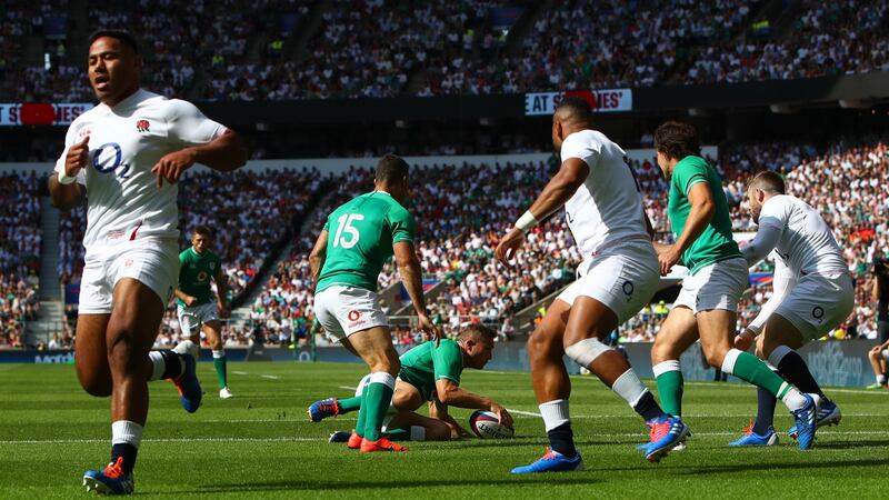 Jordan Larmour scores for Ireland during the warm-up defeat to England. Photograph: James Crombie/Inpho