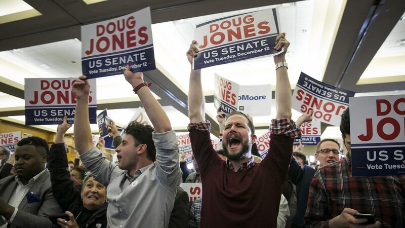 Supporters of Democratic candidate Doug Jones celebrate his Senate election win in Birmingham, Alabama. Photograph: Nicole Craine/Bloomberg
