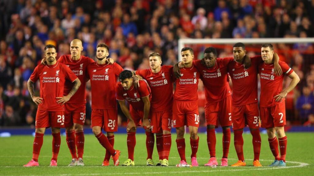 Liverpool players look on during a penalty shoot out in the Capital One Cup third round match against Carlisle United at Anfield. Photograph: Alex Livesey/Getty Images