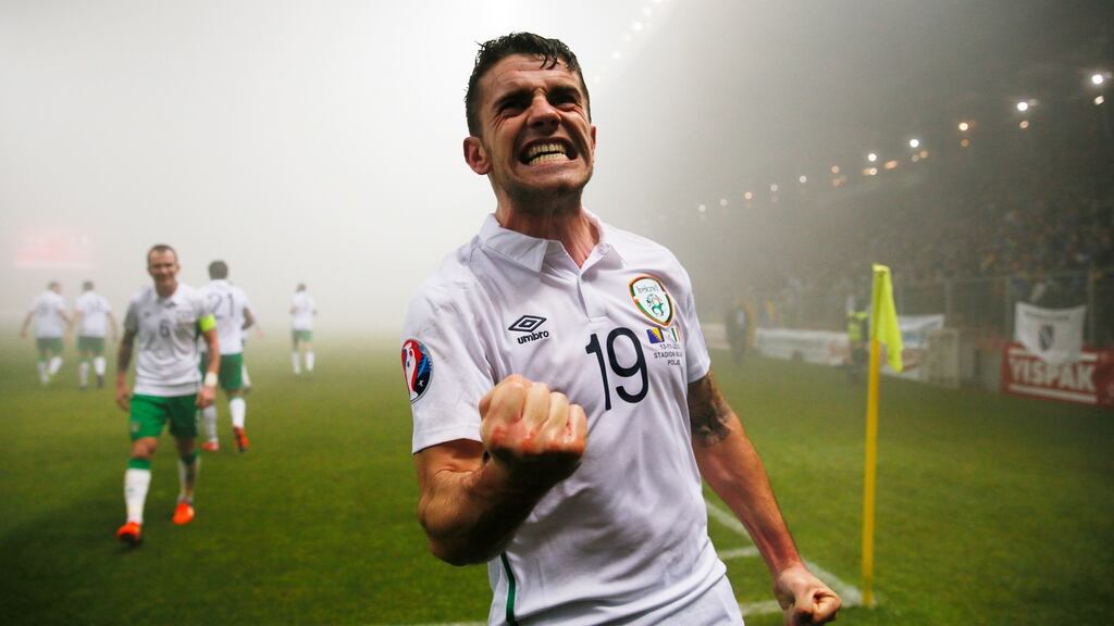 Robbie Brady celebrates after scoring.