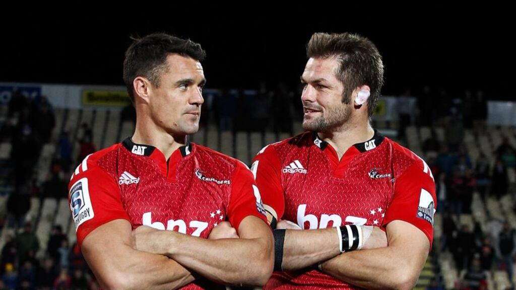 Dan Carter and Richie McCaw pose after the round 13 Super Rugby match between the Crusaders and the Reds at AMI Stadium in Christchurch. Photo: Martin Hunter/Getty Images