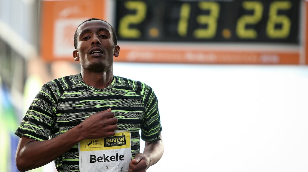 Asefa Bekele of Ethiopia crossing  the line to win the 2018  Dublin Marathon. Photograph: Oisin Keniry/Inpho