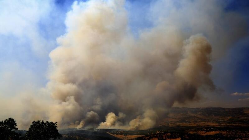 A picture made available on August 19th shows smoke rising during armed clashes between Turkish soldiers and PKK militants at Lice district, Diyarbakir, on August 18th, 2015. Photograph: EPA