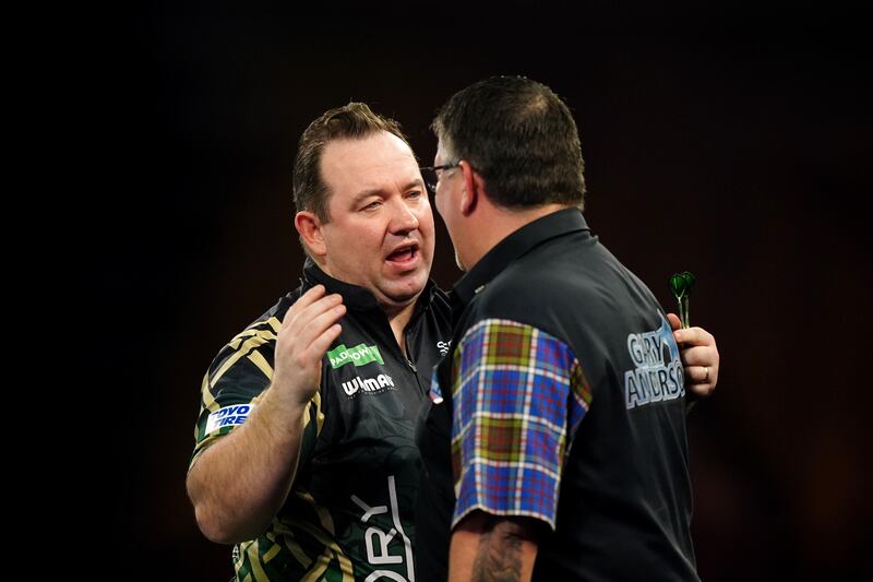 Brendan Dolan reacts after beating Gary Anderson in their last 16 match at the Paddy Power World Darts Championship at Alexandra Palace in London. Photograph: Zac Goodwin/PA Wire