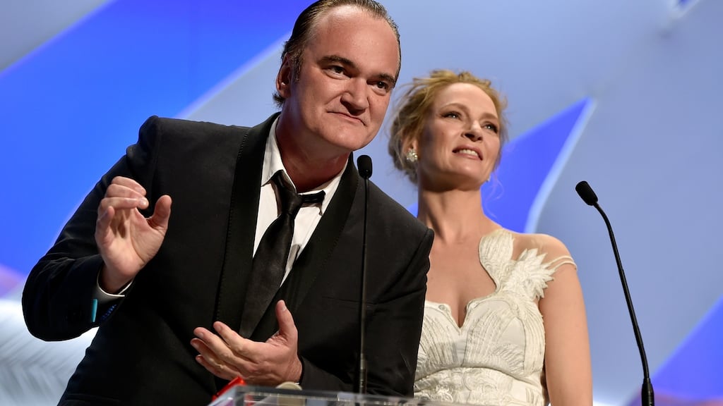 Director Quentin Tarantino and actress Uma Thurman appear on stage to give the Palme d’Or award during the Closing Ceremony at the 67th Annual Cannes Film Festival in 2014. Photograph: Pascal Le Segretain/Getty Images