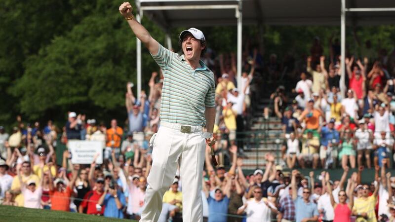 Rory McIlroy celebrates as he holes a birdie putt on the 18th green to secure victory at the 2010 Quail Hollow Championship, his first win on the PGA Tour. Photograph: Scott Halleran/Getty Images
