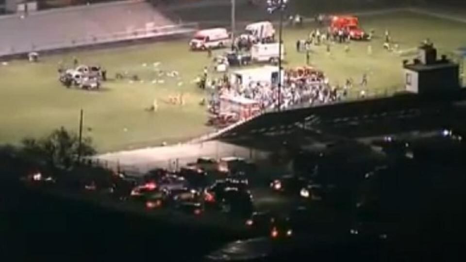 Still images from aerial footage broadcast by the BBC showing injured people being treated on a flood-lit sports field at West, Texas, that had been turned into a staging area for injured persons following the fertiliser plant blast.