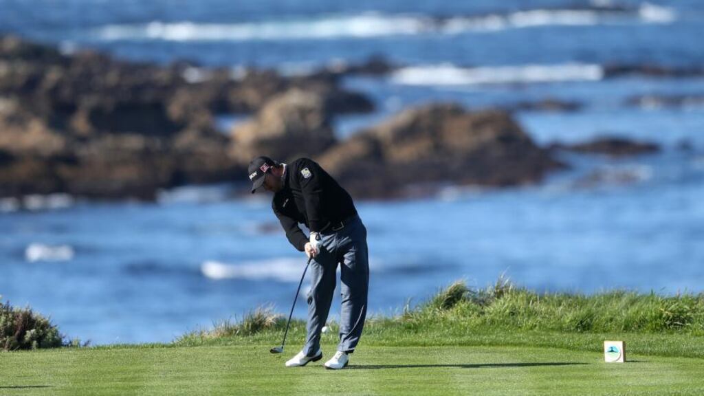 Graeme McDowell  hits his tee shot on the fourth hole at Spyglass Hill Golf Course during the first round of the   AT&T Pebble Beach National Pro-Am   in Pebble Beach, California. Photograph: Christian Petersen/Getty Images