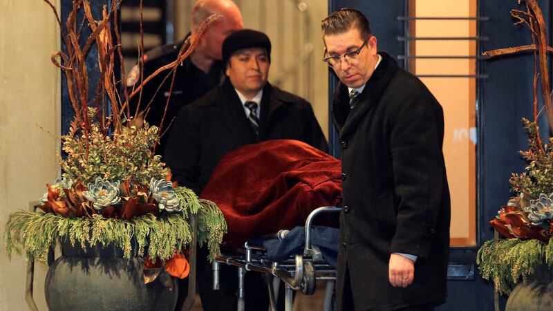 A body is removed from the home of billionaire founder of Canadian pharmaceutical firm Apotex. Barry Sherman and his wife Honey were found dead at their home under circumstances that police described as ‘suspicious’ in Toronto. Photograph: Reuters