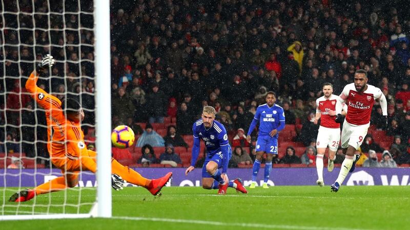 Alexandre Lacazette of Arsenal scores his team’s second goal. Photograph: Catherine Ivill/Getty Images