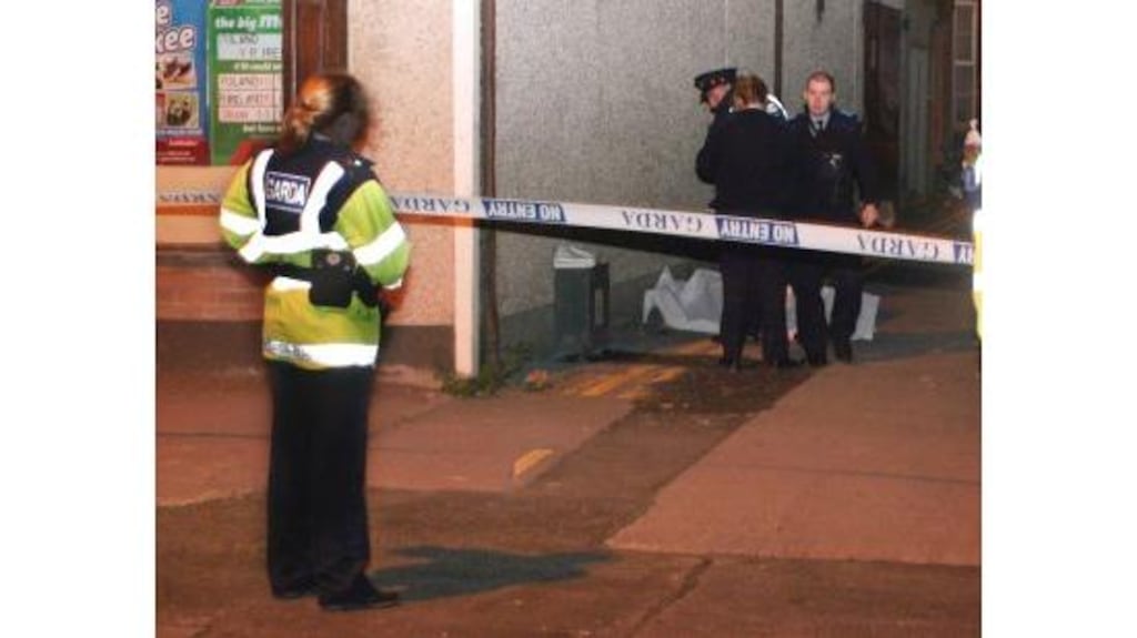 Gardai at the scene of the fatal stabbing in Davis Street, Limerick, on Tuesday night. The man who died has been named as Mr Rory Brady (25), originally from the Corbally area of the city.