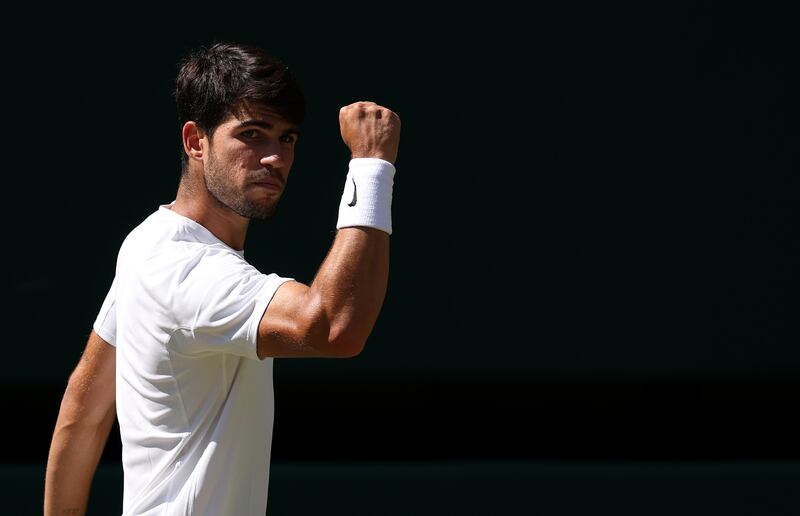 Carlos Alcaraz celebrates a point against Taylor Fritz in their Wimbledon semi-final. Photograph: Julian Finney/Getty Images
