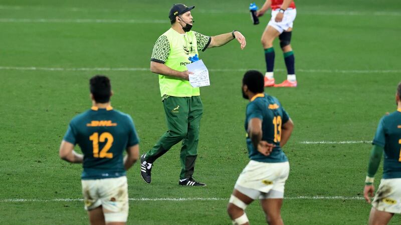 Rassie Erasmus, the South Africa director of rugby, acts as a water carrier as he instructions during the first Test. Photograph: David Rogers/Getty Images