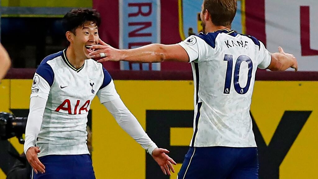 Son celebrates his winner for Spurs against Burnley with Harry Kane. Photograph: Jason Cairnduff/Getty/AFP