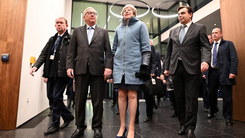 Jean-Claude Juncker, president of the European Commission, welcomes British prime minister Theresa May at the European Parliament in Strasbourg on Monday night. Photograph: Patrick Seeger/EPA.