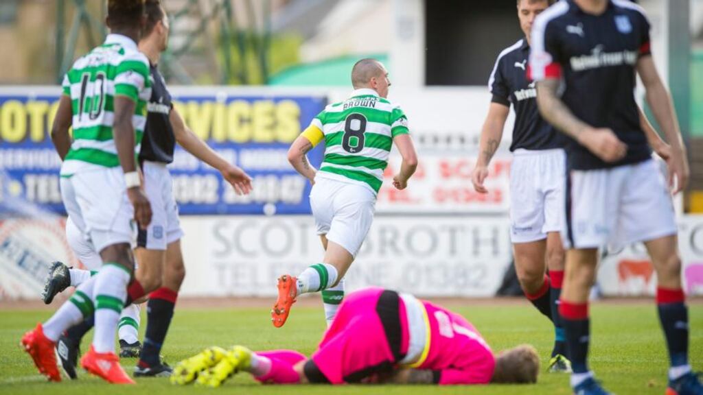Celtic’s Scott Brown celebrates scoring his side’s only goal of the game during the Scottish Premiership match at Dens Park, Dundee. Photo: Craig Watson/PA Wire.