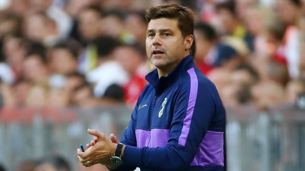 Mauricio Pochettino watches his team beat Real Madrid in pre-season. Photograph: Reuters