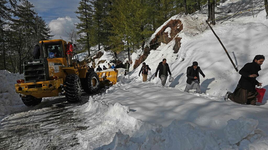 More than 4ft (1.2m) of snow fell in the area of the Murree Hills resort, near the capital Islamabad, on Friday night and early on Saturday. Photograph: Aamir Qureshi/AFP via Getty Images