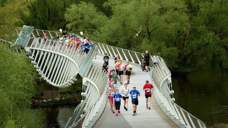 Living bridge: the Barrington’s Hospital Great Limerick Run started at the People’s Park surrounded by Georgian Limerick and wound its way through historical, sporting and cultural sites, such as the Treaty Stone and Thomond Park Stadium before finishing on O’Connell Street. Photograph: Seán Curtin/FusionShooters