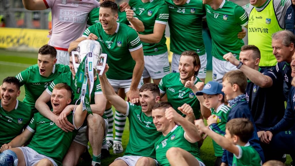 Limerick players celebrate wit the Liam MacCarthy Cup. Photo: Morgan Treacy/Inpho