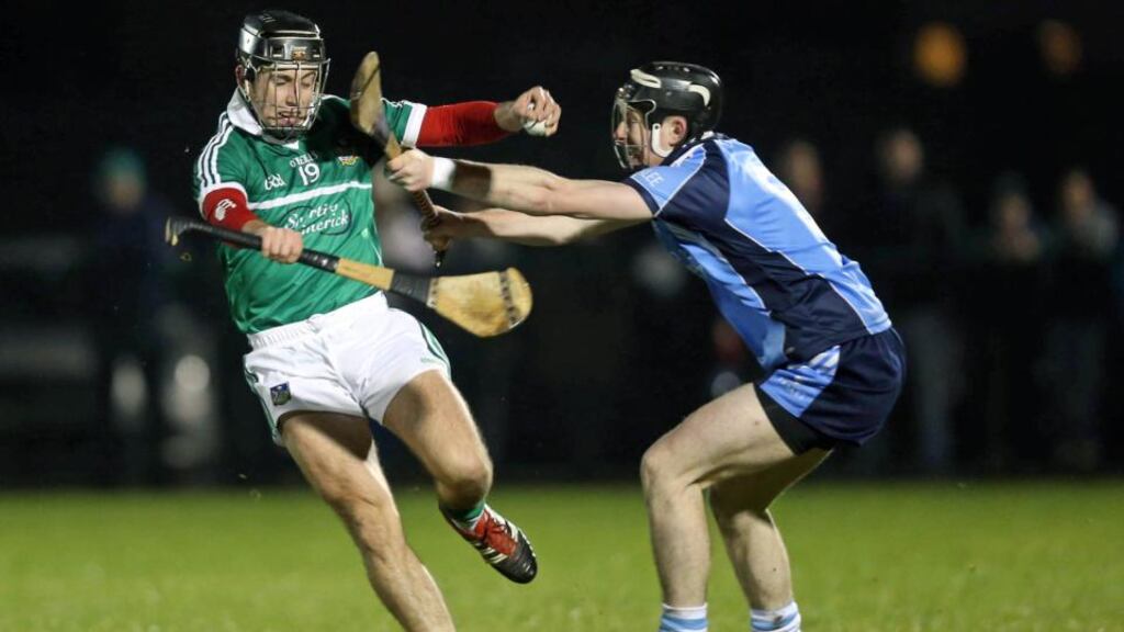 John Fitzgibbon of Limerick is tackled by IT Tralee’s Brian Murphy during the Waterford Crystal Cup in Rathkeale. Photograph: Donall Farmer/Inpho.