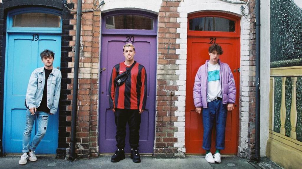 Baxter Robot (centre) pictured with his Happyalone bandmates, Slee and Paperclip Photograph: Zach Cronin.