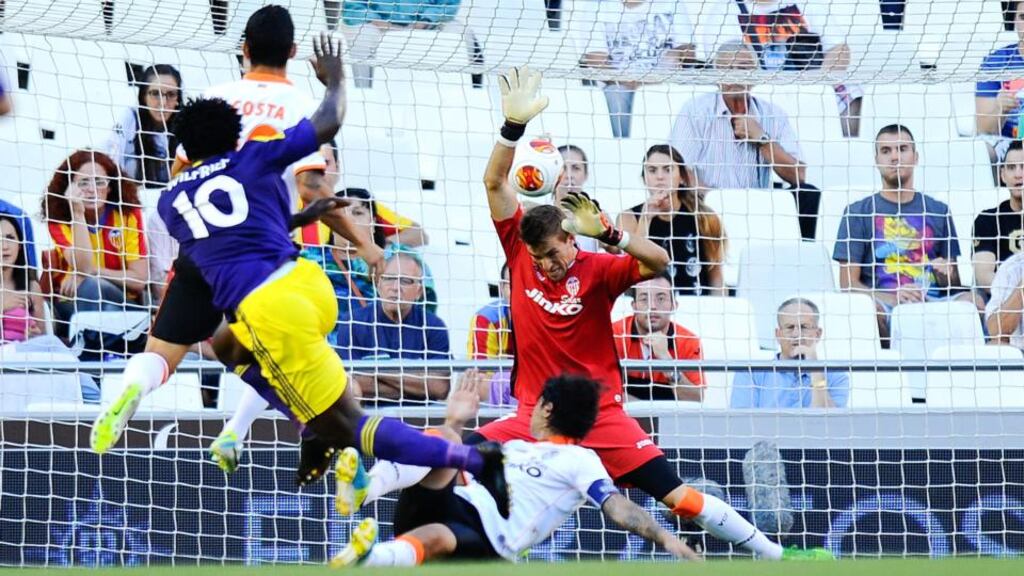 Wilfried Bony of Swansea City scores the opening goal against Valencia during the Uefa Europa League Group A match at Estadi de Mestalla. Photograph: David Ramos/Getty Images