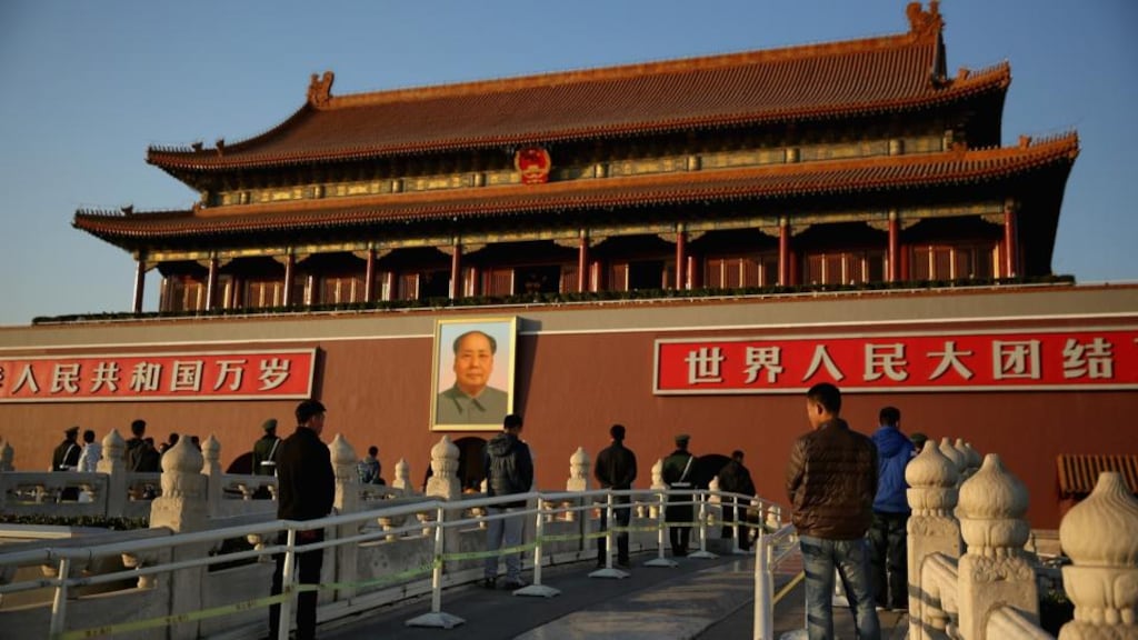 Plainclothes policemen guard in front of Tiananmen Gate outside the Great Hall of the People where the Communist Party’s 205-member Central Committee gathered for its third annual plenum today in Beijing, China. Photograph: Feng Li/Getty Images