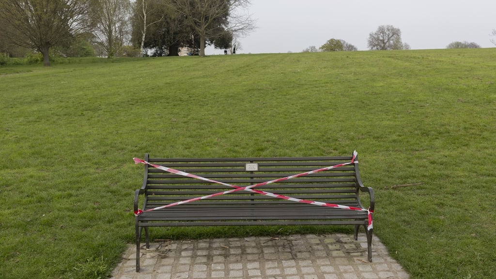 A park bench in Brockwell Park, London, that was taped off to stop people sitting on it in the early days of the pandemic in April 2020. Photograph: Richard Baker/In Pictures via Getty Images