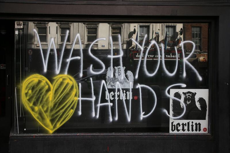 Wash your Hands: A sign painted in the window art of Berlin D2 in early March. Photograph: Nick Bradshaw/The Irish Times