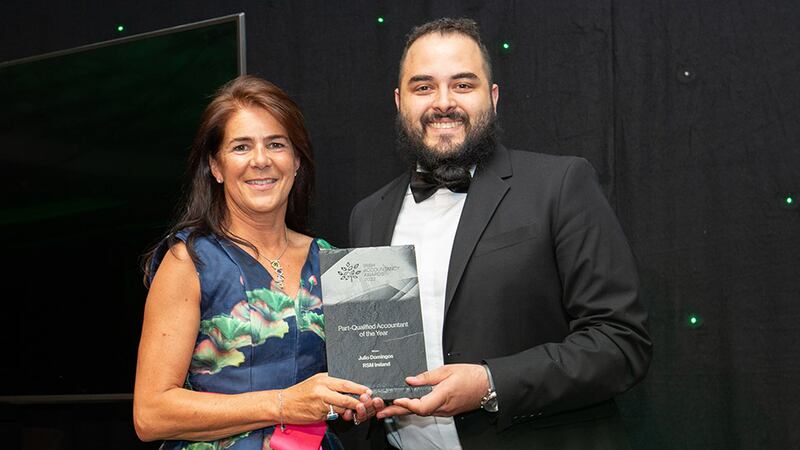 Anne Keogh, awards judging co-ordinator, presents the Part-Qualified Accountant of the Year award to Julio Domingos, RSM Ireland.
