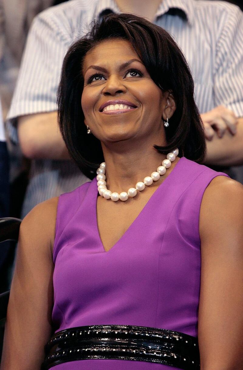 Michelle Obama in a brighter hue, during her husband’s first presidential campaign, 2008. Photograph: Chip Somodevilla/Getty Images