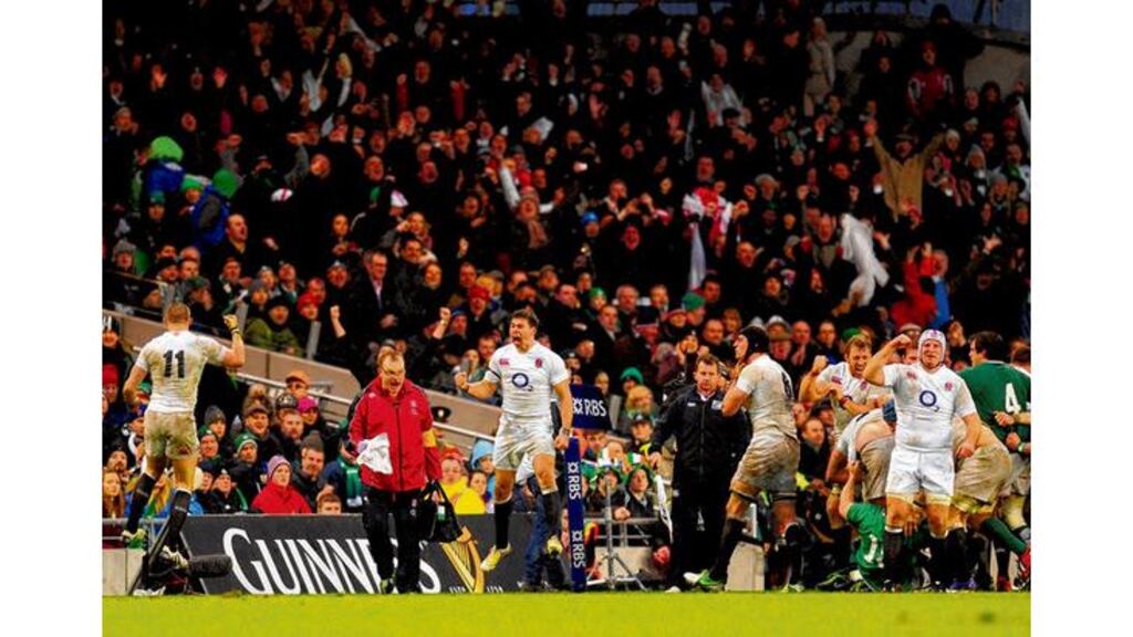 England's Ben Youngs and Mike Brown lead the celebrations at the final whistle following the victory over Ireland at the Aviva Stadium. photograph: stu foster/getty