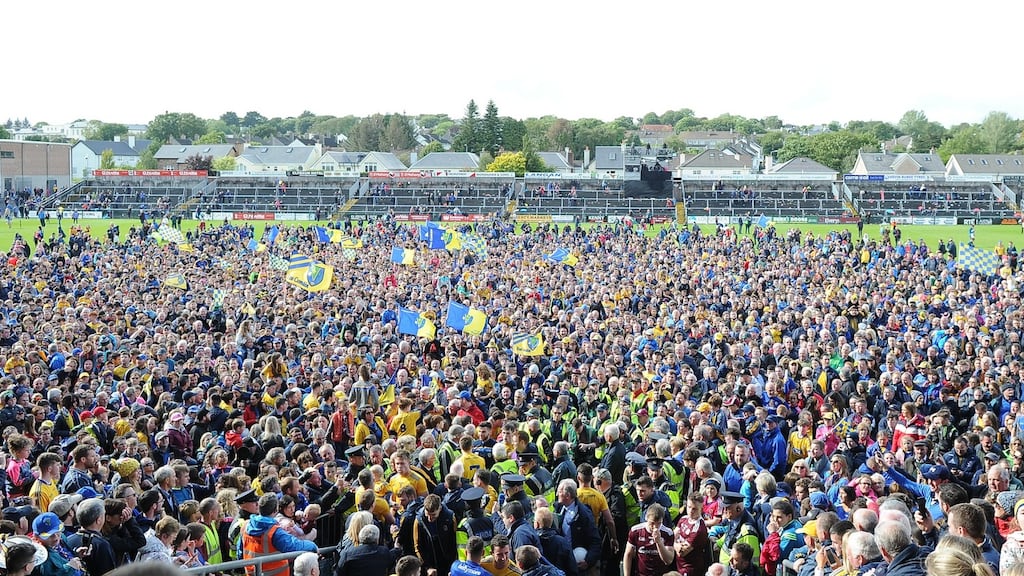 Massed ranks of the Roscommon faithful celebrate on the pitch following the Connacht final win over Galway at Pearse Stadium in Salthill. Photograph: Tommy Grealy/Inpho