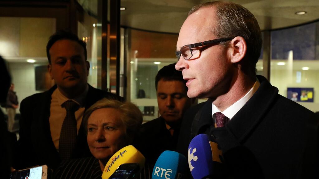 Leo Varadkar, Frances Fitzgerald, Pascal Donohoe and Simon Coveney leaving Trinity College Dublin: The emerging water deal will see a commission of experts established to examine issues such as alternative charging systems. Photograph: Nick Bradshaw
