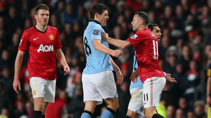 Barry and Giggs clash during a Manchester derby in 1998. Photo: Alex Livesey/Getty Images
