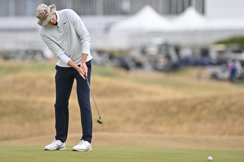 England amateur Barclay Brown makes a birdie putt on the 17th green during his opening round at St Andrews. Photograph: Glyn Kirk/AFP via Getty Images