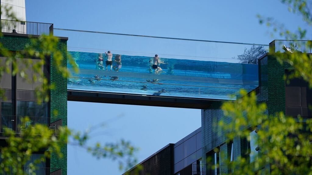 Nice day for a newsworthy swim: Sky Pool, a watery bridge between two residential buildings in Nine Elms, south London. Photograph: Aaron Chown/PA
