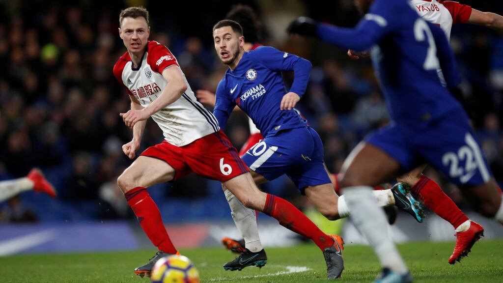 Chelsea’s Eden Hazard in action with West Bromwich Albion’s Jonny Evans. Photograph: Eddie Keogh/Reuters