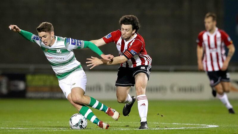 Dylan Watts of Shamrock Rovers and Barry McNamee of Derry City. Photo: Ryan Byrne/Inpho