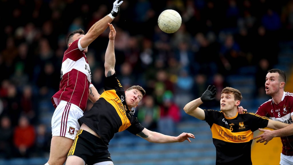 Mullinalaghta’s Aidan McElligott challenges  David O’Leary of Dr Crokes in Thurles. Photograph: Ryan Byrne/Inpho