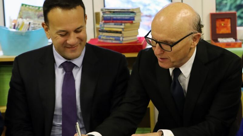 Taoiseach Leo Varadkar and US business man David McCourt who leadsThe Irish Broadband consortium sign the National Broadband plan in Co Wicklow. Photograph: Niall Carson/PA Wire