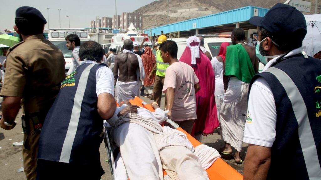 Saudi emergency personnel carry an injured pilgim after a stampede in Mina, near the holy city of Mecca. Photograph: Getty Images