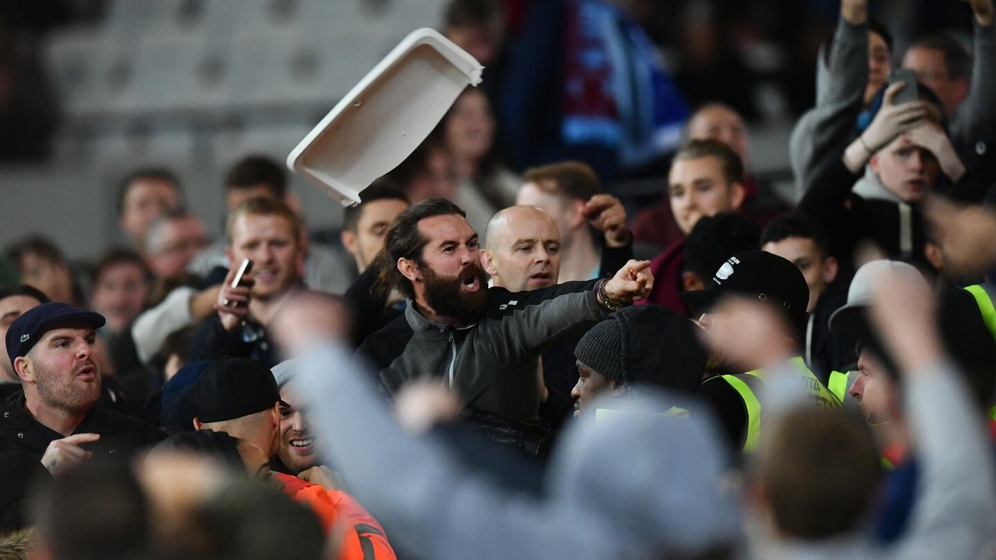 West Ham and Chelsea fans clash during the EFL Cup fourth round match at The London Stadium. Photo: Dan Mullan/Getty Images