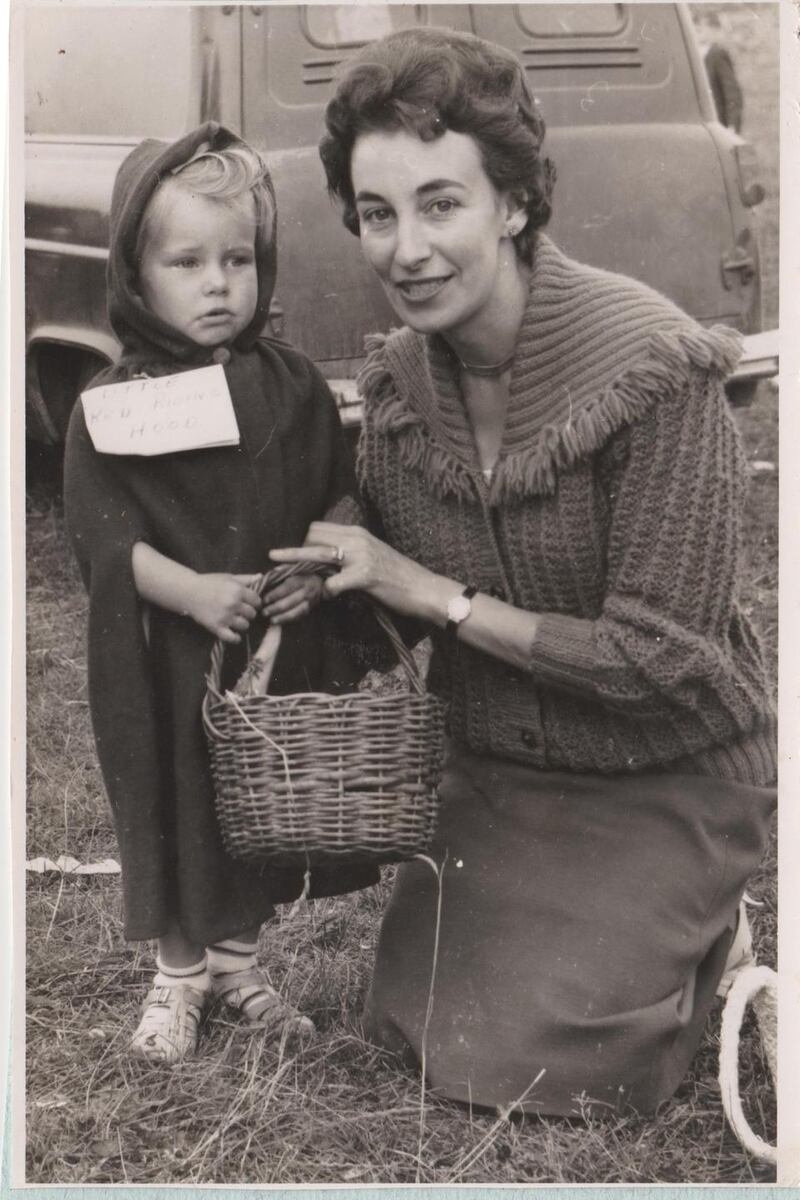 Catherine Foley dressed as Little Red Riding Hood with her mother at Geneva Barracks