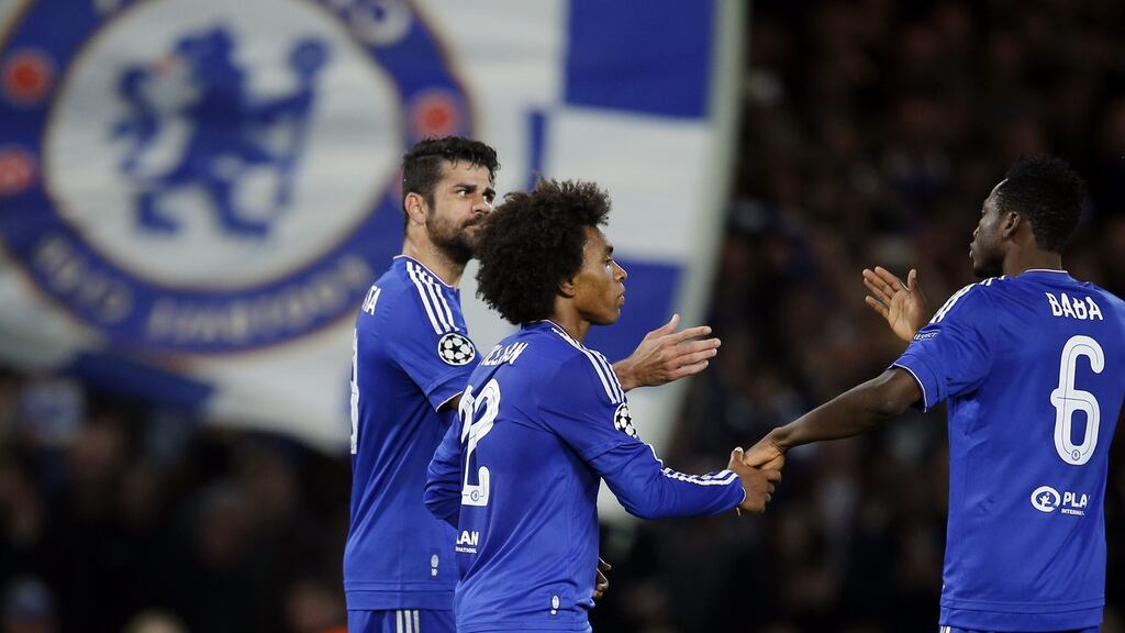 Chelsea’s Diego Costa, Willian and Baba Rahman celebrate at Stamford Bridge. Photograph: Andrew Couldridge/Reuters