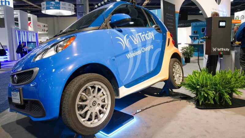 A WiTricity wireless car charger is shown under an electric car during the 2015 International Consumer Electronics Show in Las Vegas. Photograph: Steve Marcus/Reuters