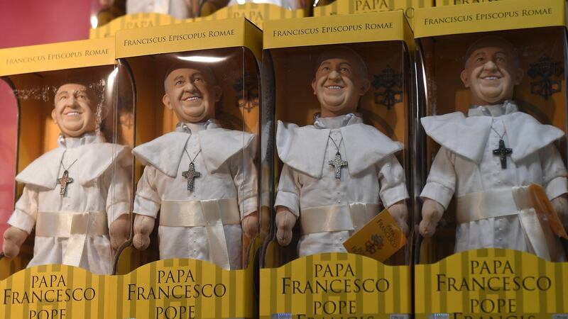 Pope Francis dolls are for sale at a stall at the pastoral congress at the World Meeting of Families at the RDS in Dublin. Photograph: Reuters/ Clodagh Kilcoyne