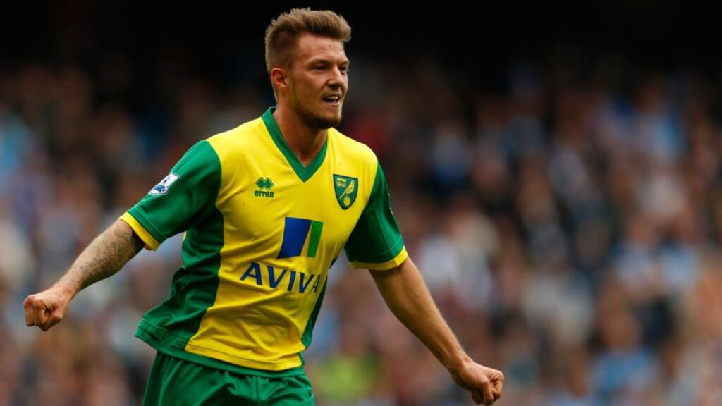 Anthony Pilkington of Norwich celebrates his goal against Manchester City at the Etihad Stadium yesterday. Photograph: Paul Thomas/Getty Images