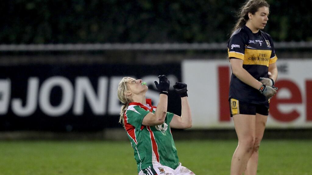 Carnacon’s Cora Staunton with Aisling O’Sullivan of Mourneabbey at the final whistle. Photograph: Oisín Keniry/Inpho